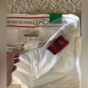 Large- NEW Rawlings pro style pants.